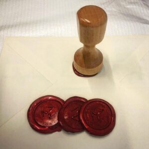 triskelion mystery event envelope seal